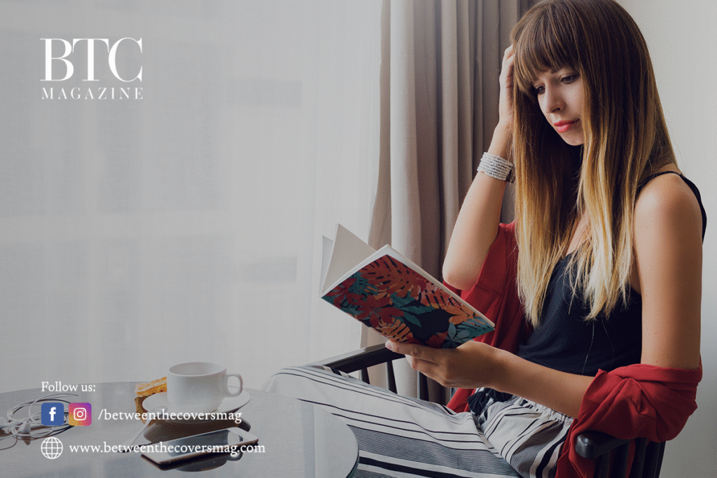 A mom fully focused on reading BTC magazine in the Canada